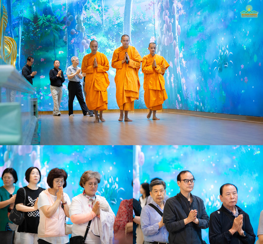 The guests attentively circumambulated around the statue of the Buddha entering Nirvana