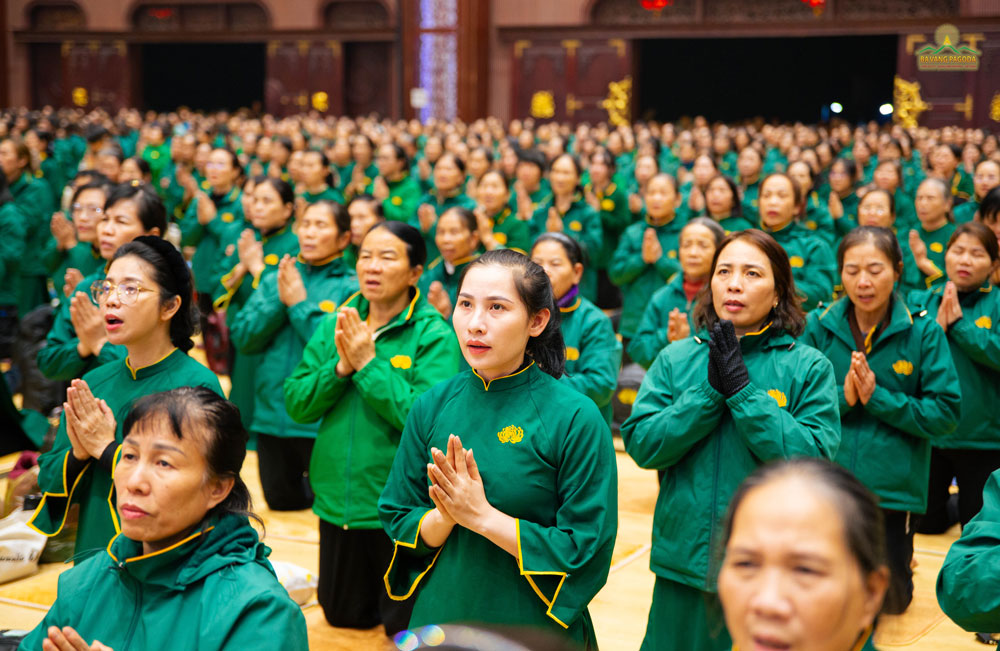 Buddhists attentively chanted sutras led by monks to repent their sins and mistakes