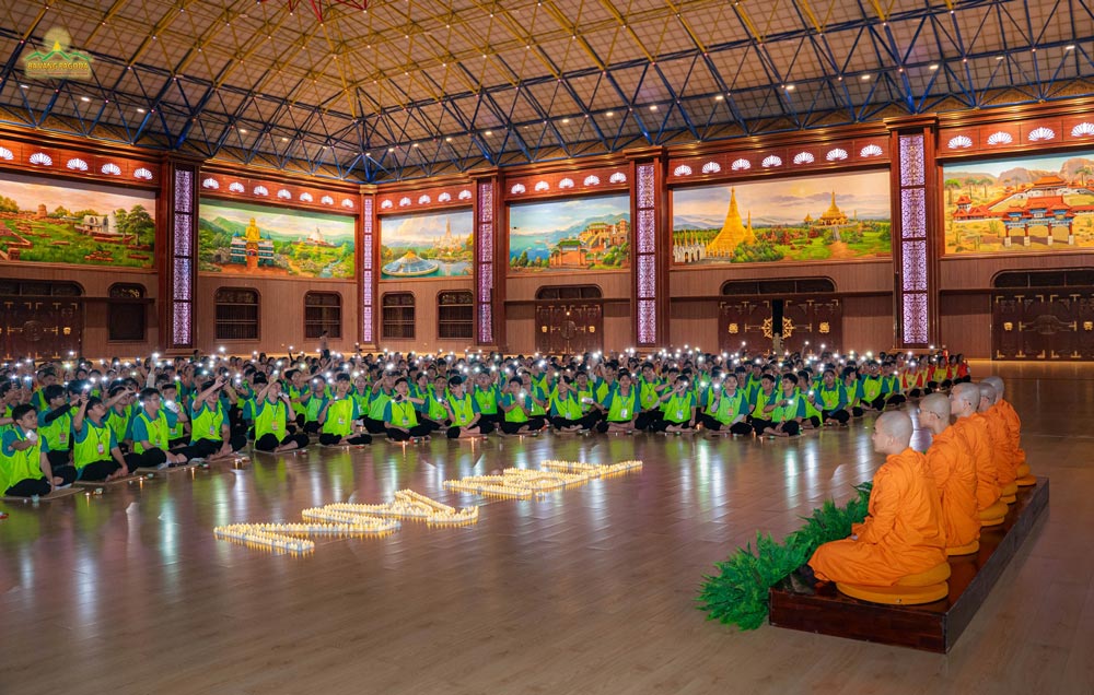Young participants raised their phone lights and sang songs of gratitude to Thay