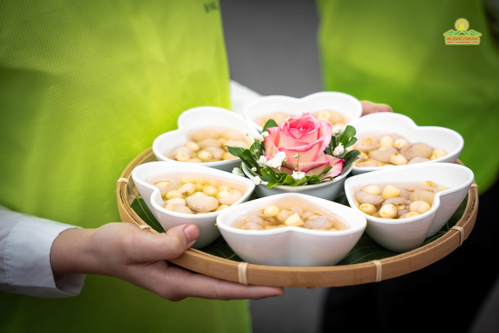 With hearts full of reverence, lay Buddhists skillfully prepared pure offerings, imbuing them with profound gratitude for the revered Buddhist King