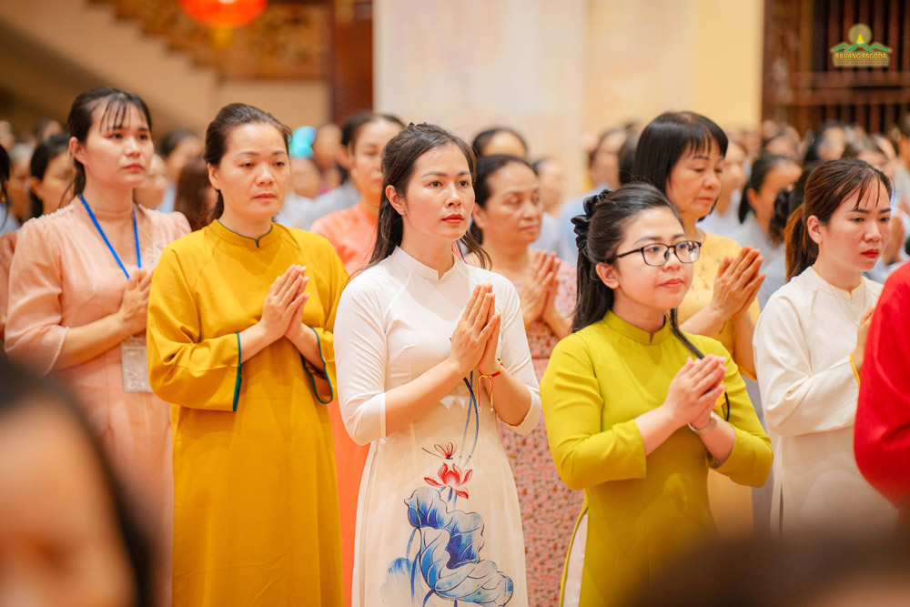 The lay Buddhists together joined their palms, respectfully directing toward the World-Honored One