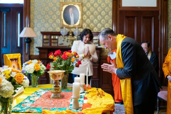 Second Gentleman Douglas Emhoff paying homage to the Buddha.
