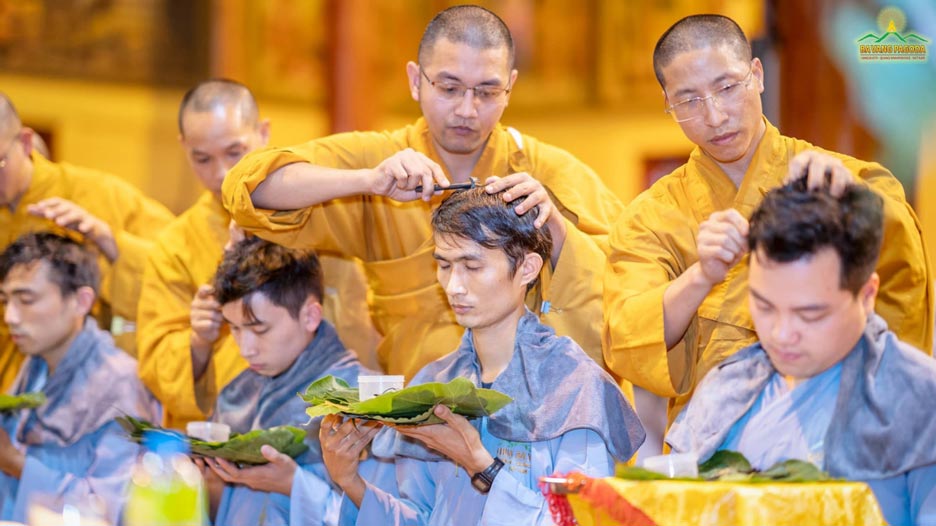 Monks shaving hair for novices.