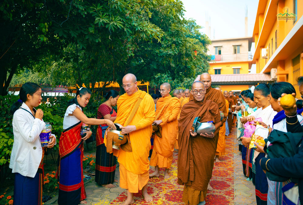 Monks practiced walking for alms, like in Buddha's time, to sustain their bodies and form a good connection with everyone.