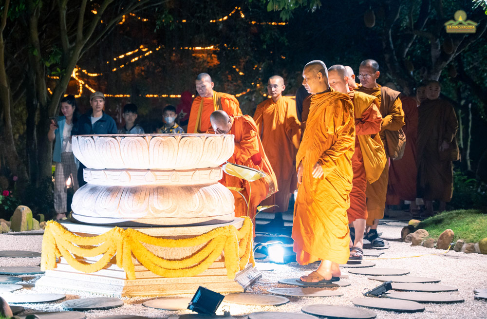 The venerable monks visited and paid homage to the Buddha's footprint stone, which is modeled after the original one at Bodh Gaya, India, the holy site where the Buddha attained enlightenment.