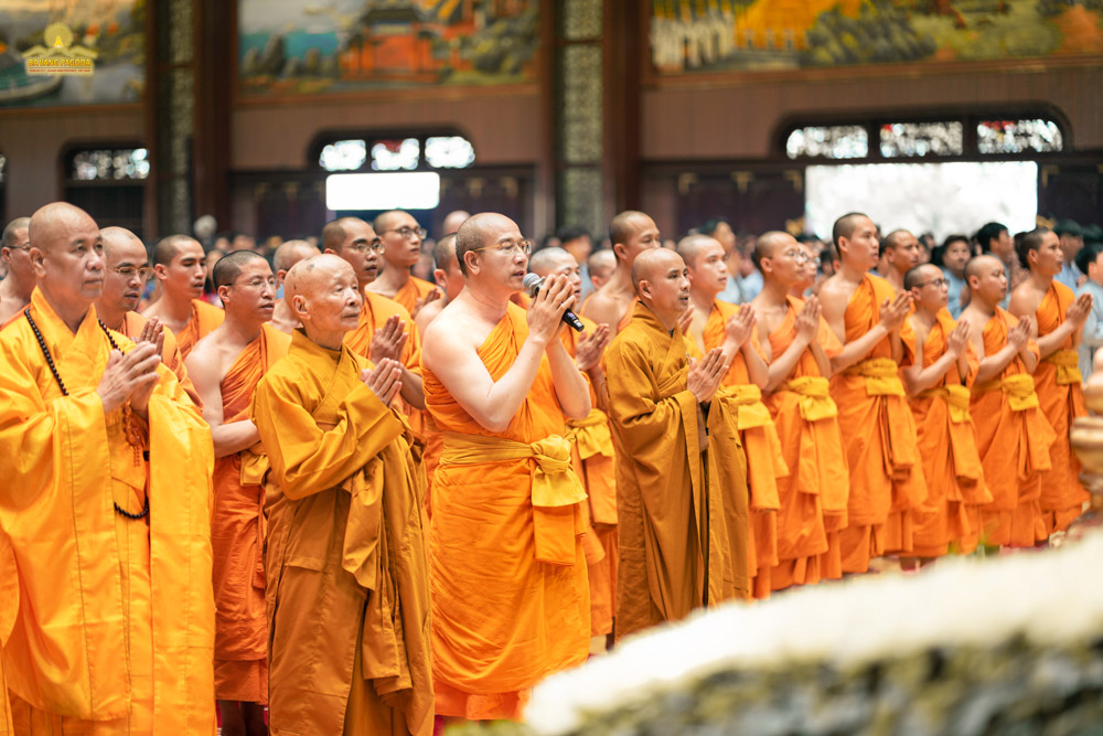 Thay and the Sangha offered incense to the Buddhas.