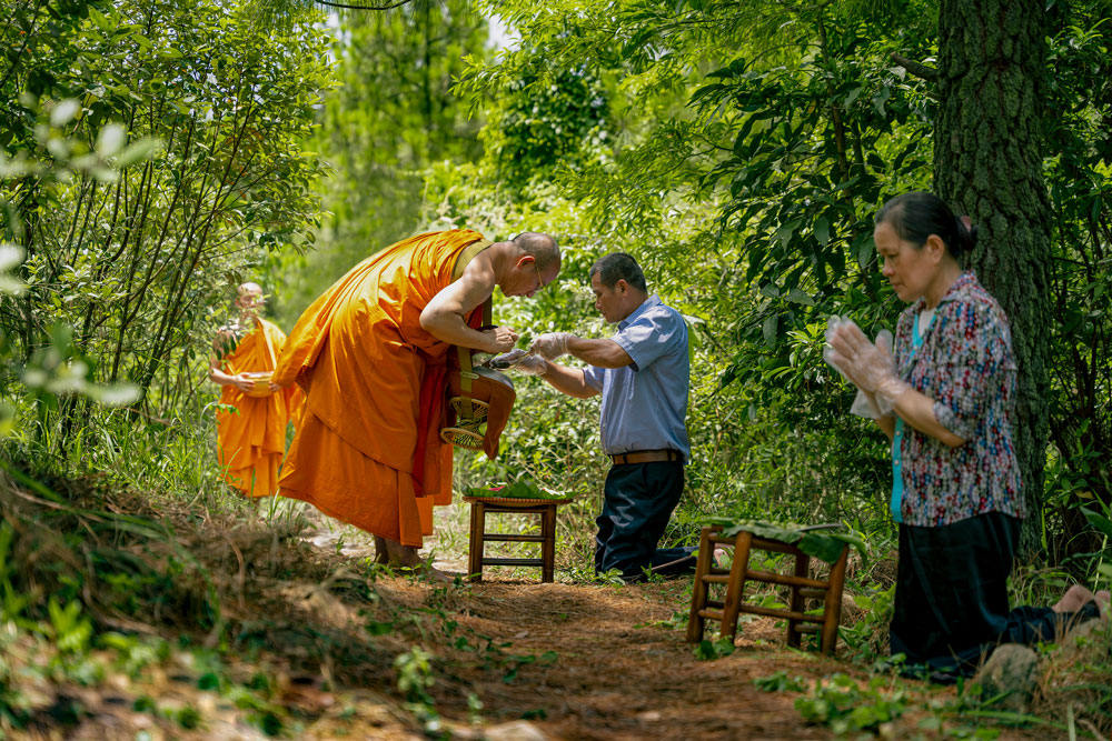Merit earned by making offerings to the Sangha can be transferred to the deceased