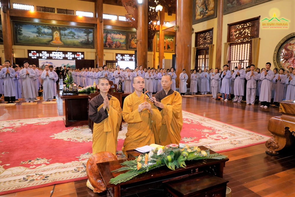 Monks of Ba Vang Pagoda perform rituals at a ceremony of transmission of eight precepts