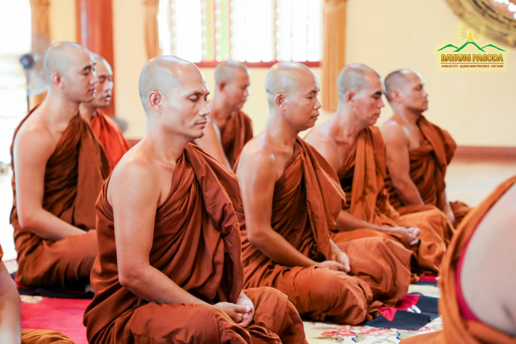 The Bhikshus meditating in the Main Hall of Ba Vang Pagoda.