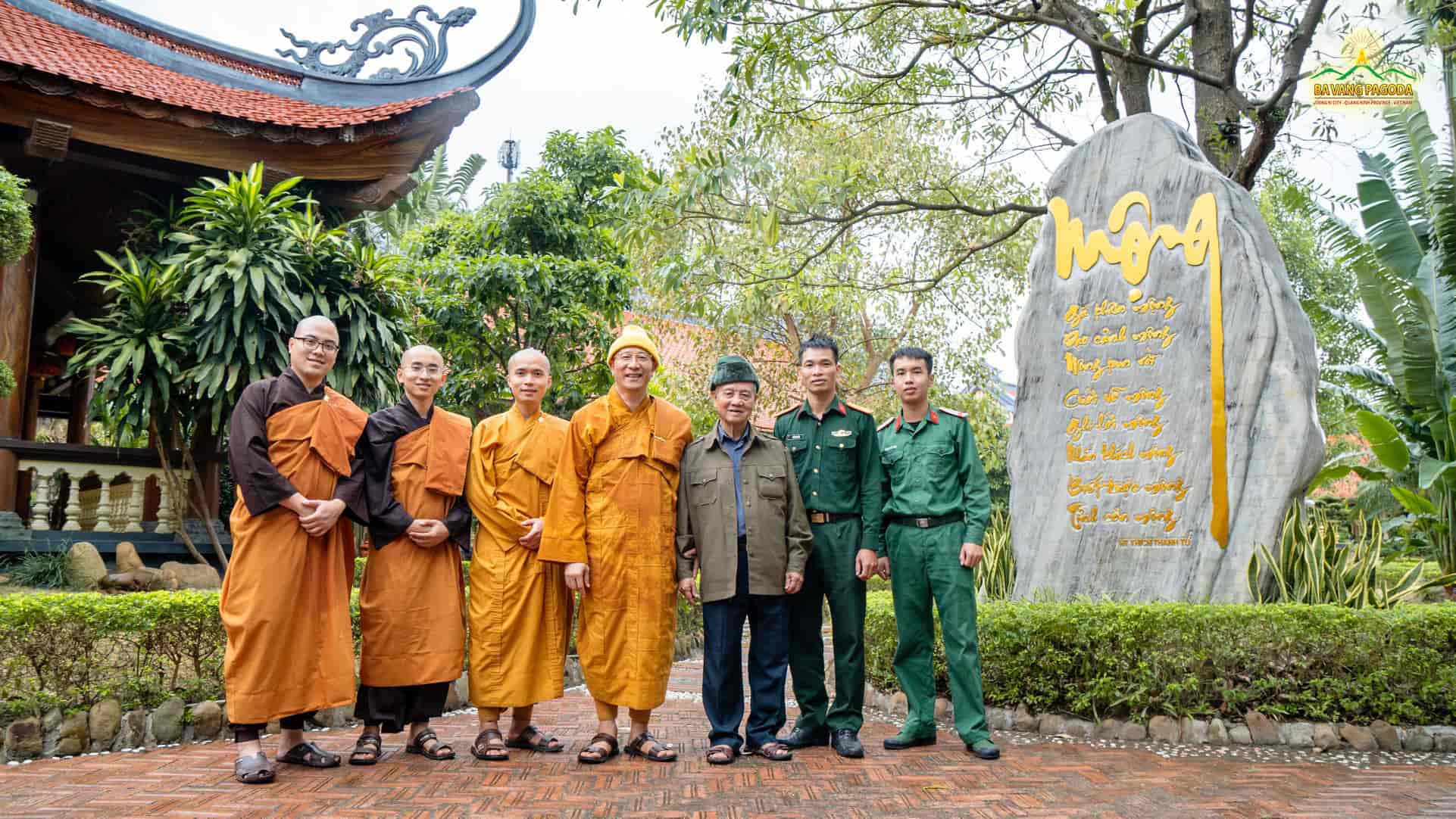  the-delegation-taking-a-photo-a-monks-monastery-of-ba-vang-pagoda