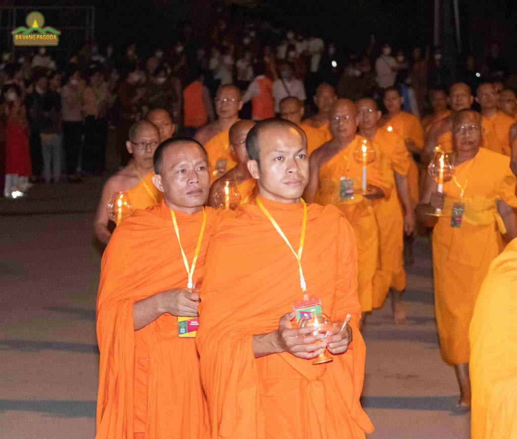 Representatives of Laos Buddhist monks in the Lantern Parade to offer to the Buddha at Ba Vang Pagoda, Vietnam.