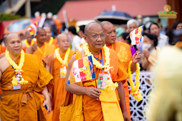 The Vietnamese monks joyously marching in the parade at Ba Vang Pagoda, Vietnam